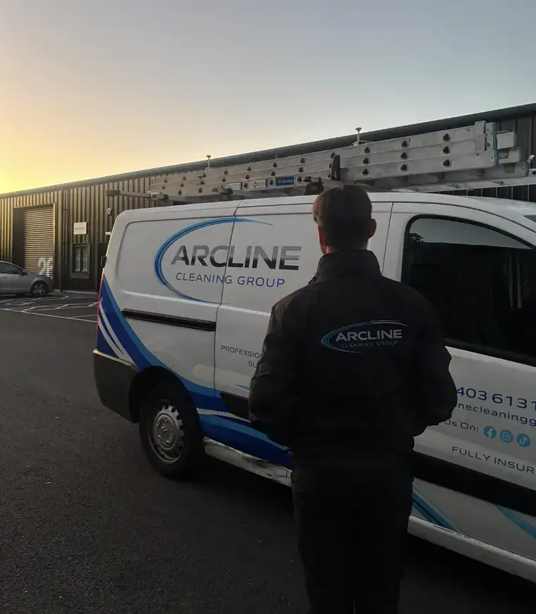 Lee in his Arcline jacket beside the Arcline Cleaning Group van